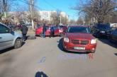 A Chevrolet collided with a Dodge while exiting a driveway in Mykolaiv.